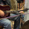 Steve playing guitar, cropped, in the studio